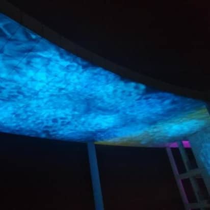 The landscape lighting projector brightens the way for students
