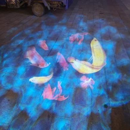 How far can the outdoor water wave projector be cast?